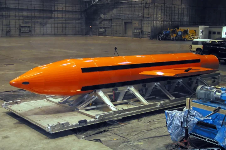 The GBU-43/B Massive Ordnance Air Blast (MOAB) bomb being prepared for a test at Eglin Air Force Base, March 2003