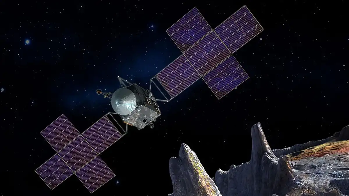 Artist's concept of NASA's Psyche spacecraft approaching the metal asteroid