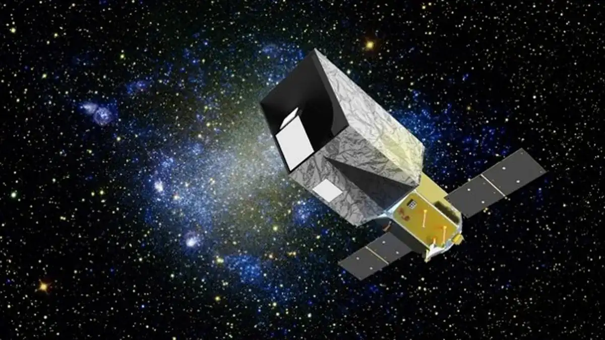 Artist’s concept of NASA’s UltraViolet EXplorer (UVEX) space telescope against a galaxy