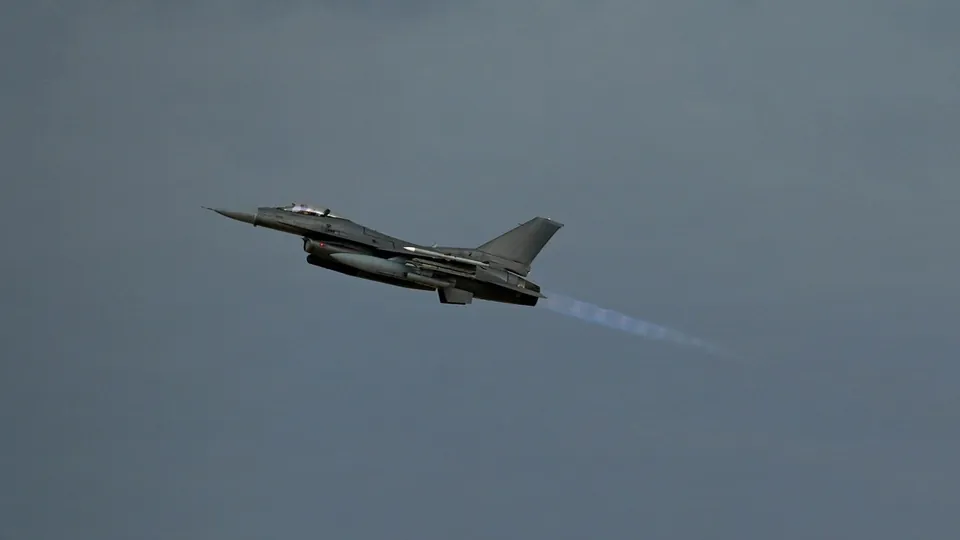 A U.S. Air Force F-16 Fighting Falcon fighter taking off from a base