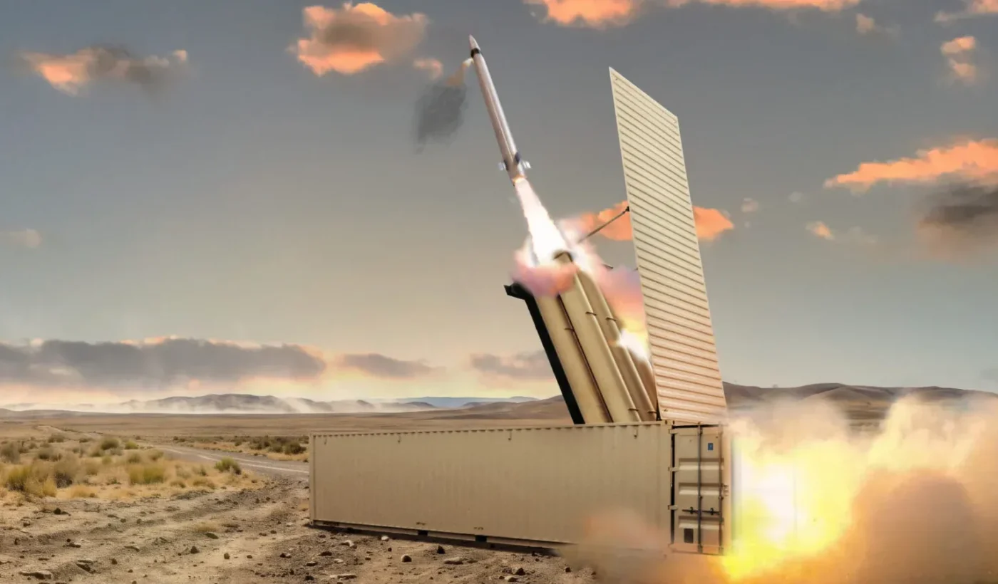A computer rendering of the PAC-3 Edge interceptor missile leaving a containerised launcher in a desert landscape, with flame and dust at the base