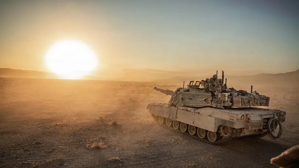 An M1A2 Abrams tank of the 4th Infantry Division on a training lane at Fort Irwin, California, during Project Convergence Capstone 6