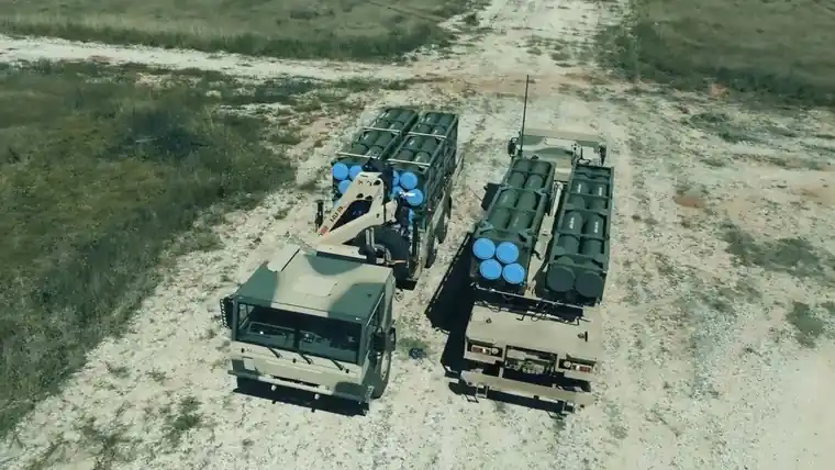 Two PULS launchers carrying different munition pods