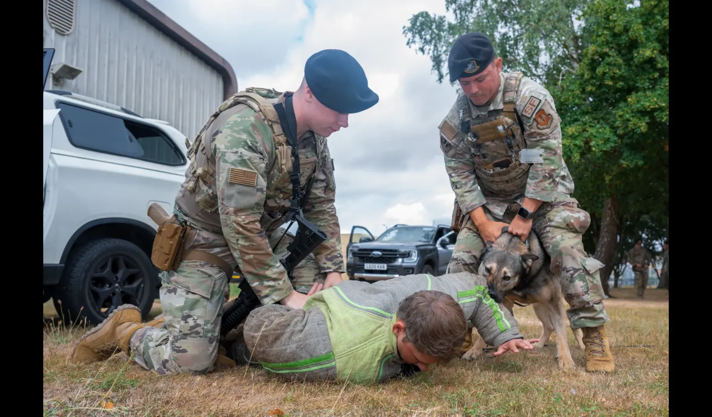 US Air Force security forces and military working dog in a July 2026 training exercise at RAF Fairford, England