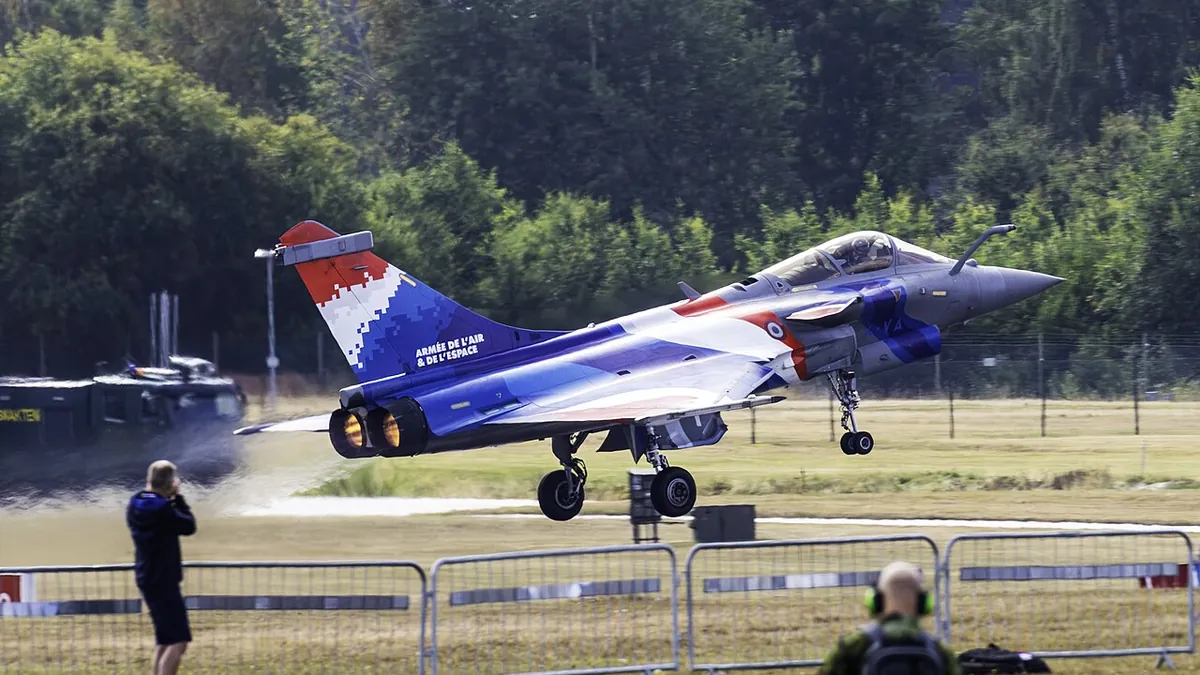 A Rafale C fighter in the tricolour livery of the French Air and Space Force taking off