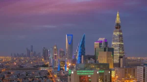The skyscrapers of Riyadh, including the Kingdom Centre and the towers of the King Abdullah Financial District, seen across the city