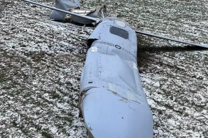 Wreckage of a Russian Kh-101 cruise missile lying on a snow-dusted field