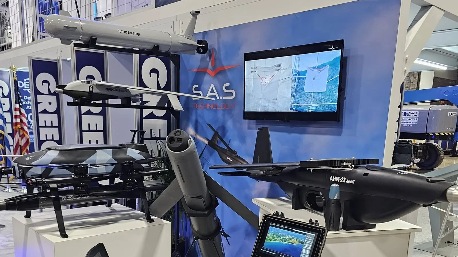The SAS Technology booth at AUSA 2026 with the SeaSting, the MFK-120X Midros, the SARISA with a rocket launcher, the AHM-2X AIHMI and the Spearhead on a tripod