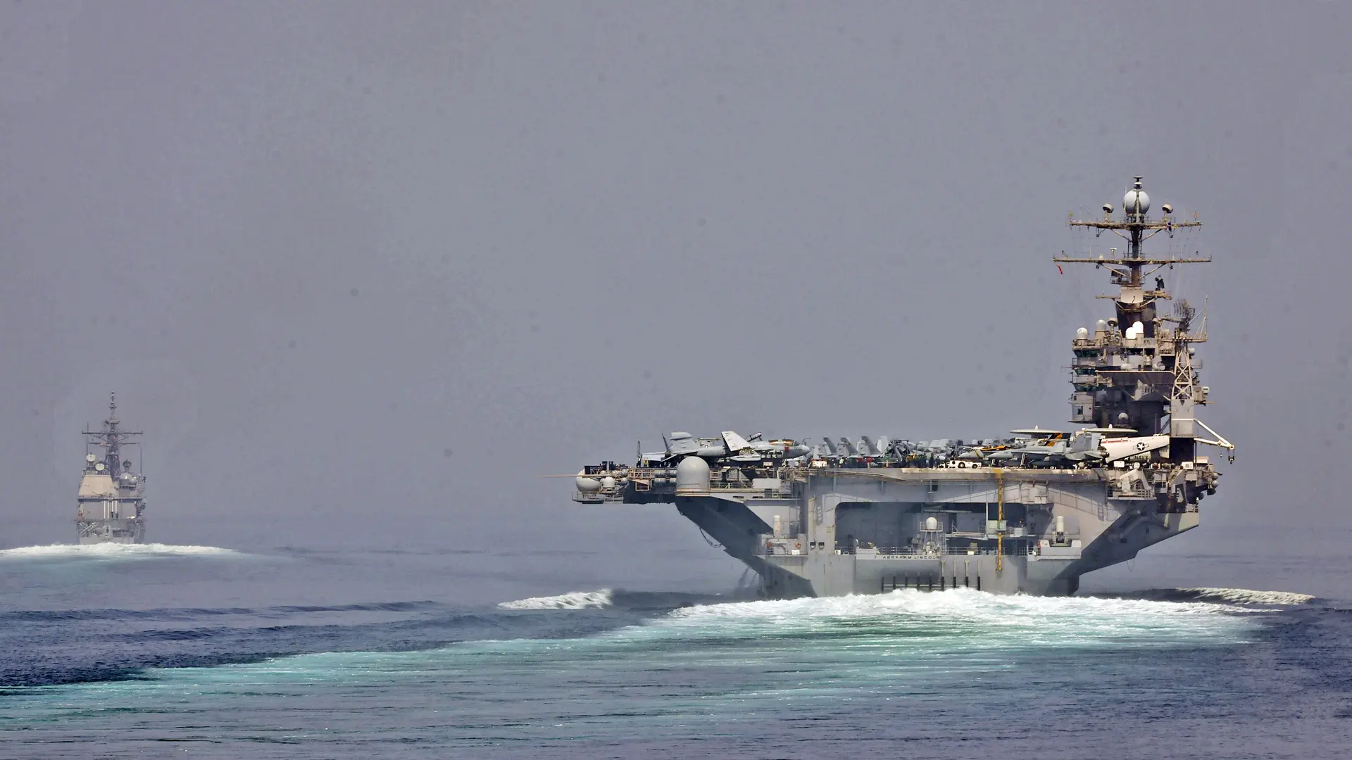 U.S. Navy ships transit the Strait of Hormuz