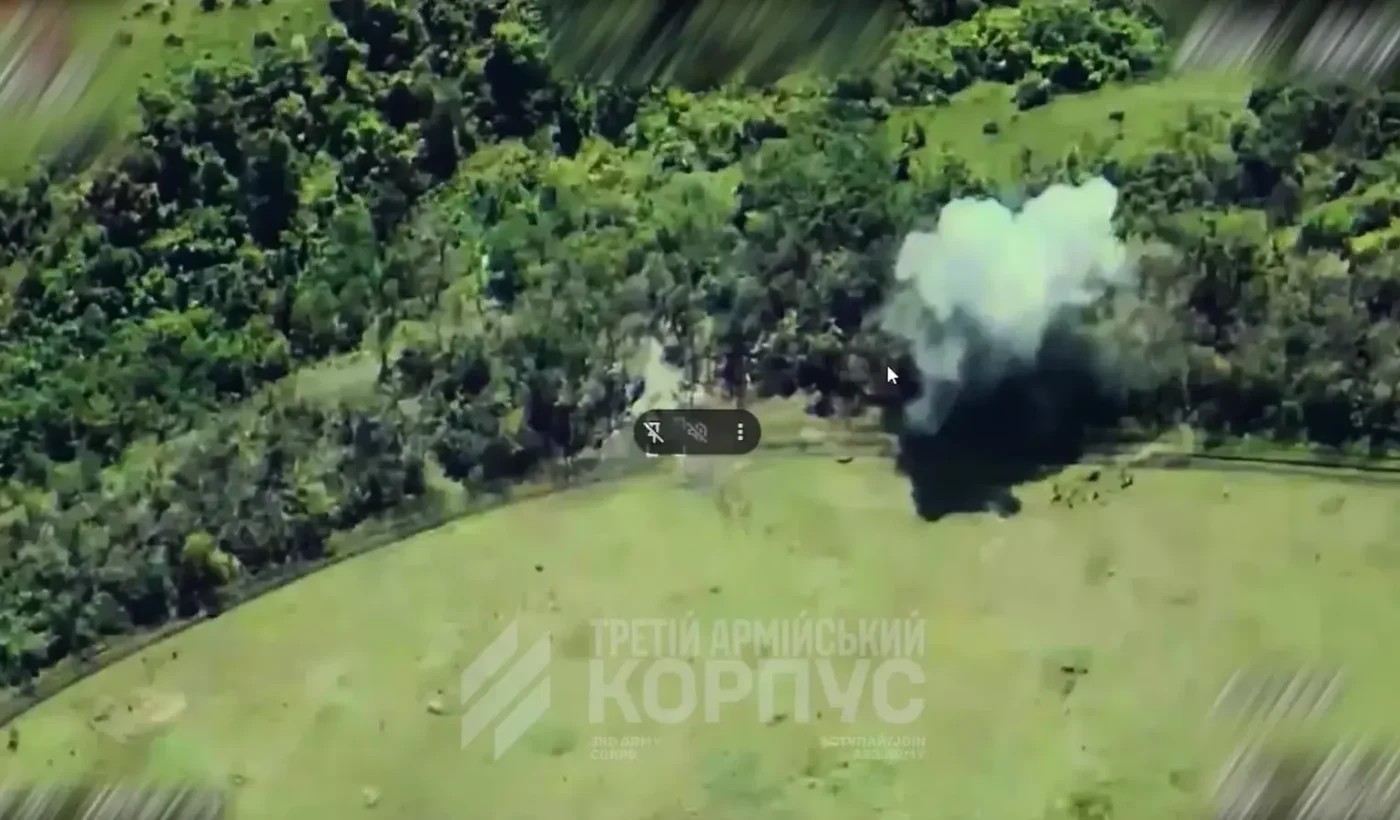 Aerial drone view of an ammunition explosion in a wooded area on the Donetsk front