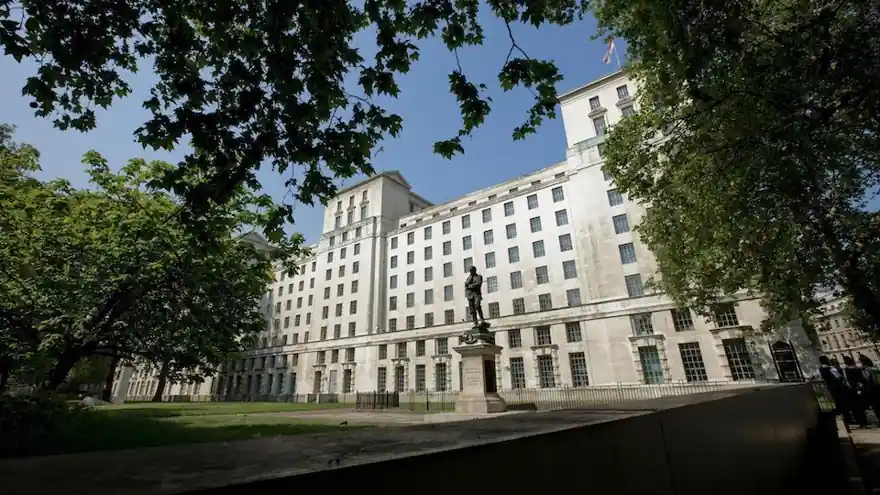 The Ministry of Defence Main Building in Whitehall, London, seen through trees