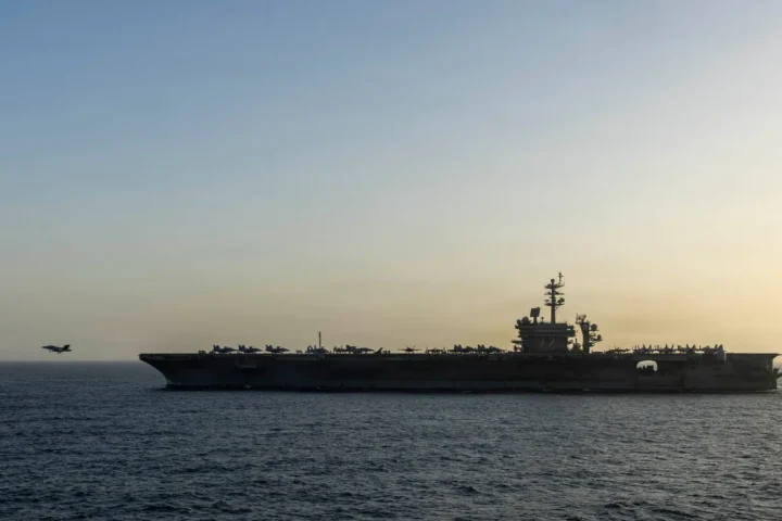 The US aircraft carrier USS Abraham Lincoln at sea with aircraft on the flight deck