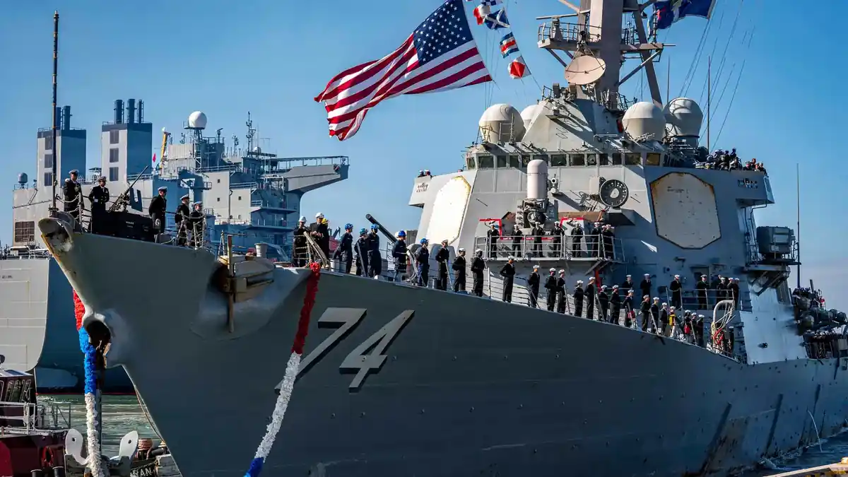 The crew of USS McFaul manning the rails on return to Naval Station Norfolk