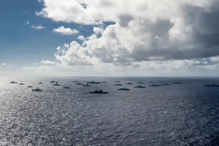 USS Theodore Roosevelt leads a group of ships in the Pacific Ocean in July 2026