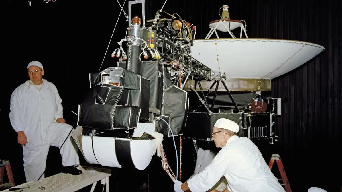 One of the two Voyager spacecraft inside the 25-foot space simulation chamber at NASA's Jet Propulsion Laboratory, April 27, 1977