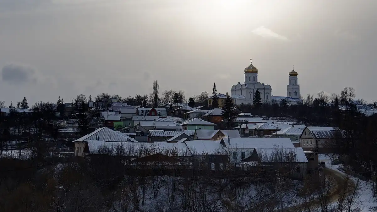 Winter view of Yelets with a white church on a hill