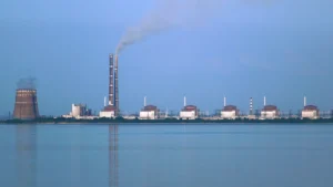 The Zaporizhzhia nuclear power plant seen across the Kakhovka Reservoir, with cooling towers and reactor buildings